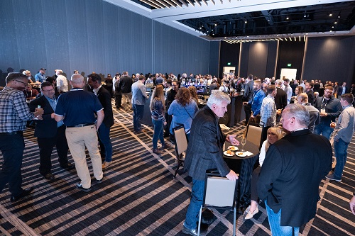 Conference participants mingling